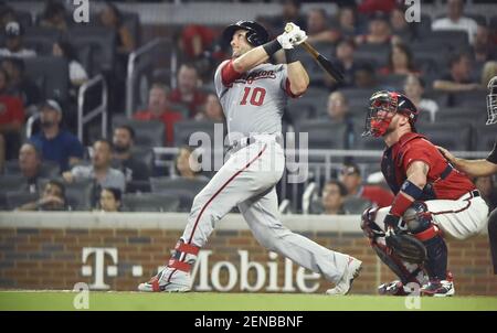 Washington Nationals catcher Yan Gomes catches a pop fly ball that was hit  by Atlanta Braves' Nick Markakis to end the top of the sixth inning of a  baseball game, Sunday, June