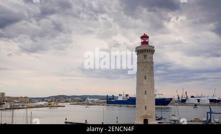 Aerial panorama of the port of Sete and the Saint Louis lighthouse, on a summer morning, in Herault in Occitanie, France Stock Photo