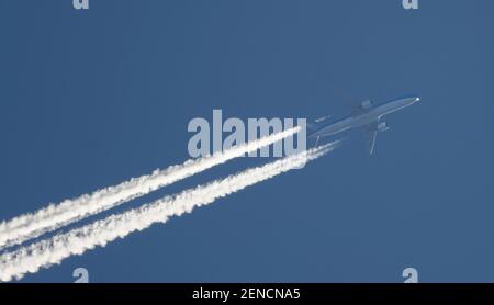Wimbledon, London, UK. 26 February 2021. KLM Boeing 777 flies over London at 32,000ft from Amsterdam en route to Quito. Credit: Malcolm Park/Alamy Live News. Stock Photo