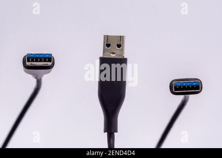 USB cable from different angles isolated against white background. Stock Photo