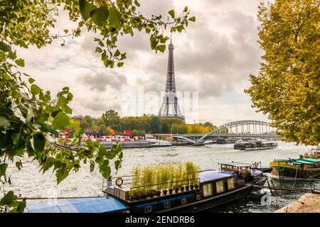 The Eiffel Tower on the Seine and the barges from avenue de New York, in Paris, France Stock Photo