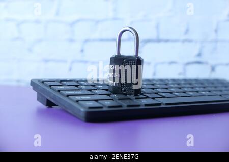 internet safety concept with padlocked on computer keyboard Stock Photo
