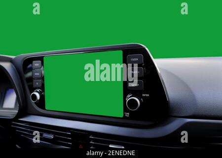 Green navigation screen on dashboard and green windscreen from inside of a modern new car. Stock Photo