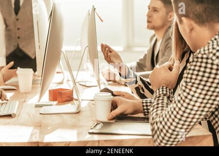 working group is working on a new project in the office Stock Photo