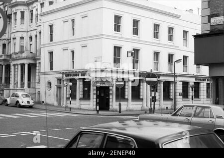 UK, West London, Notting Hill, 1973. Elgin Crescent meets with  Portobello Road. Colville Terrace opposite. Midland Bank has now closed. Stock Photo