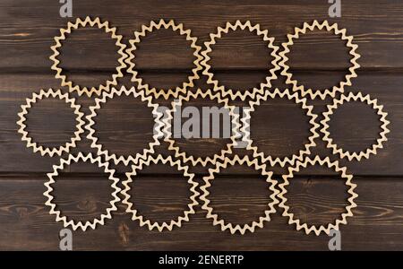 background of carved wooden circles. beautiful vintage wood patterns. laser wood carving. Stock Photo
