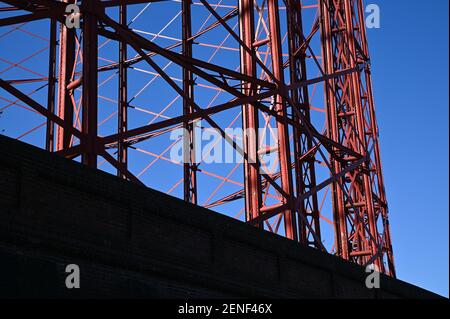 Birmingham, West Midlands UK. 26th February 2021. The last three gas holders in Birmingham, UK are to be dismantled over the coming months starting this month. The dominant structures are viewable from the M6 at Spaghetti Junction and around the Nechells area. The holders were famously painted the colours of nearby Aston Villa Football Club after the engineer in charge of maintenance opted for the colours of his favourite team. Credit: Stop Press Media/Alamy Live News Stock Photo