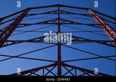 Birmingham, West Midlands UK. 26th February 2021. The last three gas holders in Birmingham, UK are to be dismantled over the coming months starting this month. The dominant structures are viewable from the M6 at Spaghetti Junction and around the Nechells area. The holders were famously painted the colours of nearby Aston Villa Football Club after the engineer in charge of maintenance opted for the colours of his favourite team. Credit: Stop Press Media/Alamy Live News Stock Photo