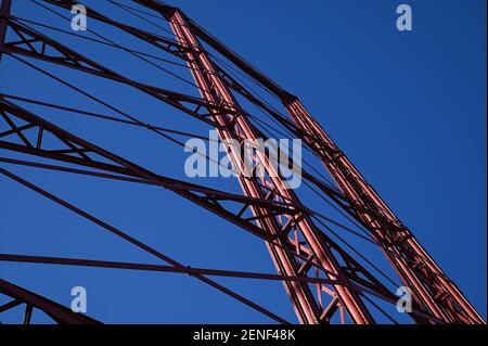 Birmingham, West Midlands UK. 26th February 2021. The last three gas holders in Birmingham, UK are to be dismantled over the coming months starting this month. The dominant structures are viewable from the M6 at Spaghetti Junction and around the Nechells area. The holders were famously painted the colours of nearby Aston Villa Football Club after the engineer in charge of maintenance opted for the colours of his favourite team. Credit: Stop Press Media/Alamy Live News Stock Photo