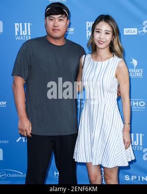 Hyun-jin Ryu and Bae Ji-Hyun attend the 4th Annual Los Angeles