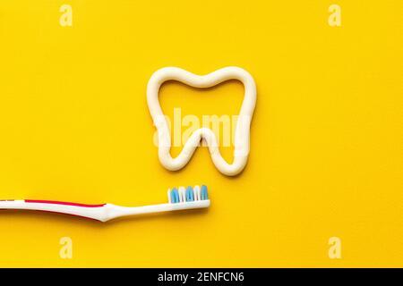 Flat lay of toothbrush with toothpaste, oral care products Stock Photo