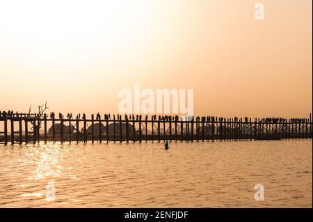 Sunset with silhouette of u bein bridge in myanmar Stock Photo
