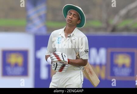 New Zealand cricketer Jeet Raval (R) looks on as Sri Lankan cricketer ...