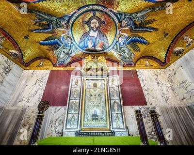 Main altar of the Sancta Sanctorum with the icon of Christ Pantocrator and above the mosaic of the 13th Century - Rome, Italy Stock Photo