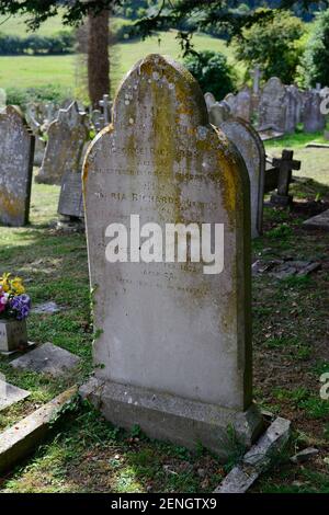 close up of a Victorian gravestone in a small church cemetery  Stock Photo