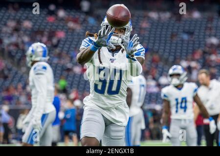 Detroit Lions defensive back Dee Virgin (30) steps on the line for