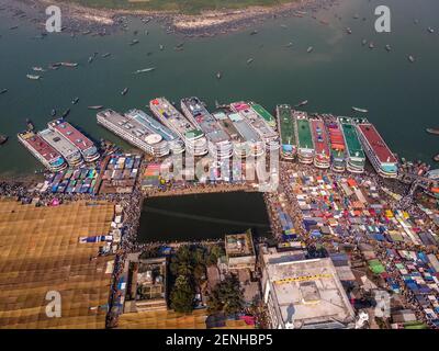 Barishal, Bangladesh. 26th Feb, 2021. As the Biggest Islamic Mehfil started today at Chormonai, Barishal in Bangladesh, around 10 Millions of People all around the country came here by those launches, boats. Credit: Mustasinur Rahman Alvi/ZUMA Wire/Alamy Live News Stock Photo