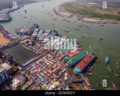 Barishal, Bangladesh. 26th Feb, 2021. As the Biggest Islamic Mehfil started today at Chormonai, Barishal in Bangladesh, around 10 Millions of People all around the country came here by those launches, boats. Credit: Mustasinur Rahman Alvi/ZUMA Wire/Alamy Live News Stock Photo