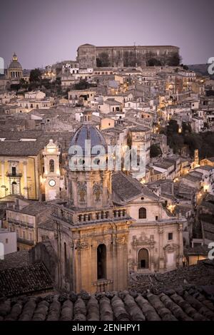 Italy,Sicily,Ragusa Ibla, view of the Baroque town with a church cupola in the foreground. Stock Photo