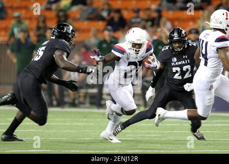 Arizona running back J J Taylor runs the 40-yard dash at the NFL