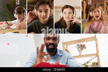 Group of kids, class studying by group video call, use video conference with each other and teacher. PC screen view with application ad. Easy, comfortable usage concept, education, online, childhood. Stock Photo