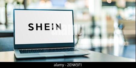 POZNAN, POL - JAN 6, 2021: Laptop computer displaying logo of Shein, an international B2C fast fashion e-commerce platform Stock Photo