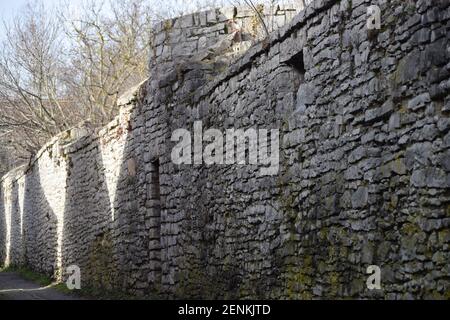 an old City wall with a Defense tower Stock Photo
