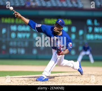 Texas Rangers pitcher Edinson Volquez makes a warm-up throw prior to the  start of a baseball game against the Seattle Mariners in Arlington, Texas,  Saturday, Aug. 12, 2006. (AP Photo/Tony Gutierrez Stock