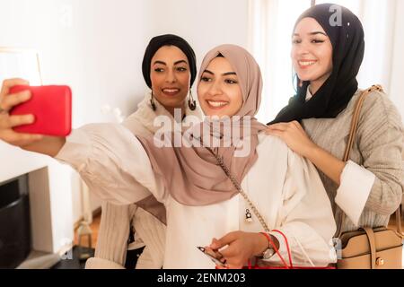 Three young women taking selfie Stock Photo