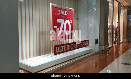 Sale of 70%.Sale poster.Shop front sale poster, discount sale marketing info.The red banner on which the sale with discounts is written. Stock Photo