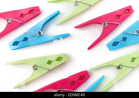 top view of multicolored clothespins on white background Stock Photo