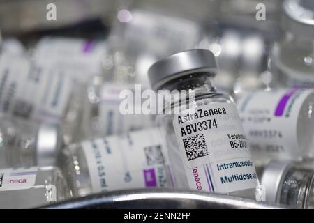 GERMANY, Hamburg, corona pandemic, largest vaccination center in Germany, for daily max 7000 people, preparation of vaccine for vaccination with syringe, empty glass vials of british swedish company AstraZeneca against corona virus Covid-19