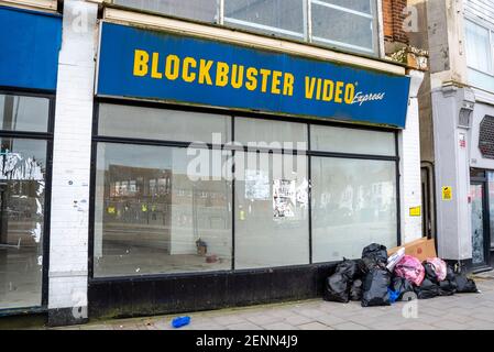 Blockbuster Video UK went into administration. Stores in the country were closed by Dec 2013. This in Westcliff on Sea, Essex still has sign. Decaying Stock Photo