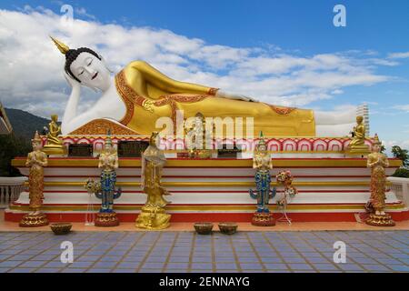 Reclining Buddha at Wat Phra That Doi Kham in Chiang Mai, Thailand. Stock Photo