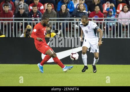 Yordan Santa Cruz 11 and Junior Hoilett 10 are seen in action