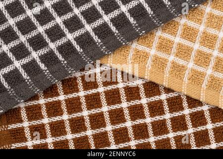 Brown, black and beige towels texture as a background. Stock Photo