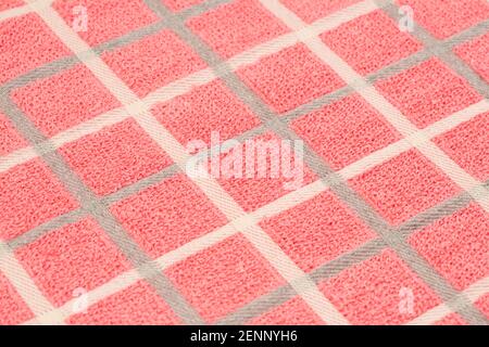 Pink, gray and white towel texture as a background. Stock Photo