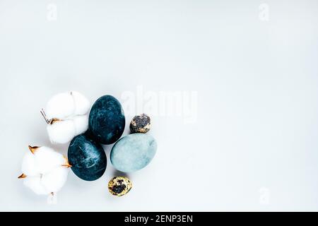 Minimalist black and gray monochromatic trendy Easter flatlay. Natural coloring concept. Eco design. Stock Photo
