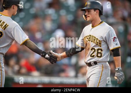 Pirates second baseman Adam Frazier steals second base as Cubs second  baseman Eric Sogard smothers the throw in the first inning on May 8, 2021,  at Wrigley Field. (Photo by John J.