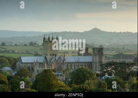 Wells Cathedral pictured with Glastonbury Tor visible in the distance Stock Photo