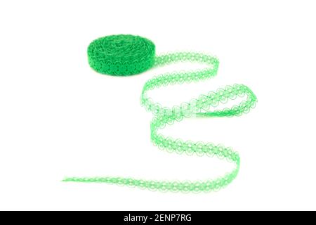 Green lace tape isolated on white background. Stock Photo