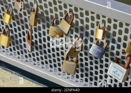 The view on the padlocks on the fence of the love bridge Stock Photo