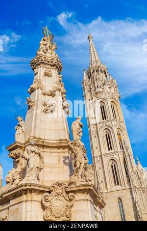 Matthias Church in Fisherman Bastion and Holy Trinity column, Budapest, Hungary Stock Photo