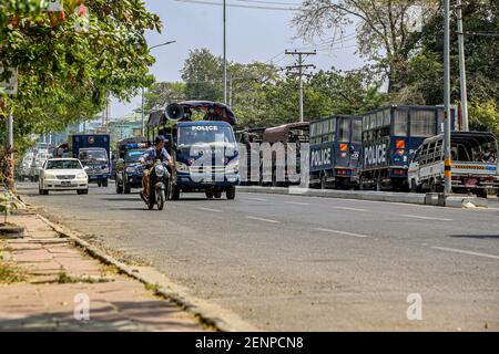 Mandalay, Myanmar. 26th Feb, 2021. Various police vehicles seen on the road during an anti-coup demonstration.Myanmar Security Forces shot at anti-military coup protesters and those close to them with slingshots, rubber bullets and other materials thus injuring young children and many were arrested. Credit: SOPA Images Limited/Alamy Live News Stock Photo