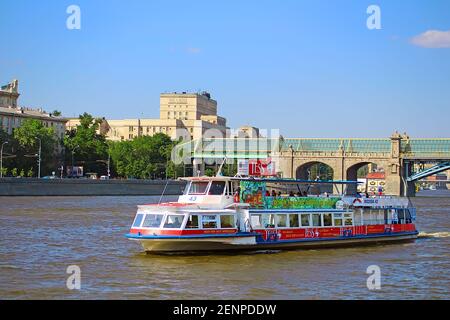 MOSCOW, RUSSIA - JUNE 05, 2013: View of Moscow river, pleasure boat and Pushkinsky Bridge Stock Photo