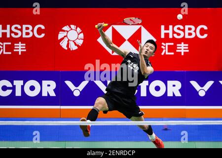 Chinese professional badminton player Chen Long competes against ...