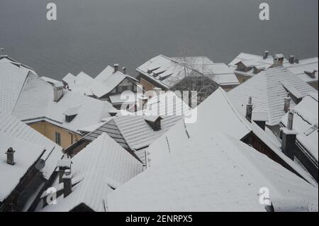 Hallstatt village from above in winter during snowfall, Hallstatt, Inner Salzkammergut, Austria Stock Photo