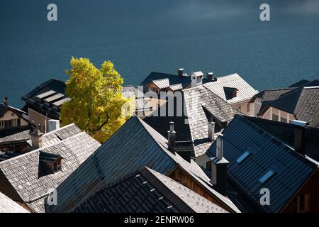 wooden roofs and boat-houses of Hallstatt village on the lakeshore of Hallstaetter See, Upper Austria, Inneres Salzkammergut Stock Photo