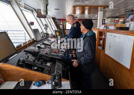 The bridge of the Ocean Adventurer cruise ship while saling along the Polar Ice cap on the north of Spitsbergen, Norway. Stock Photo