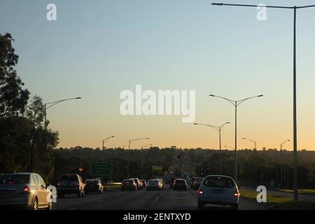 Rush hour traffic on highway network during dusk. Stock Photo